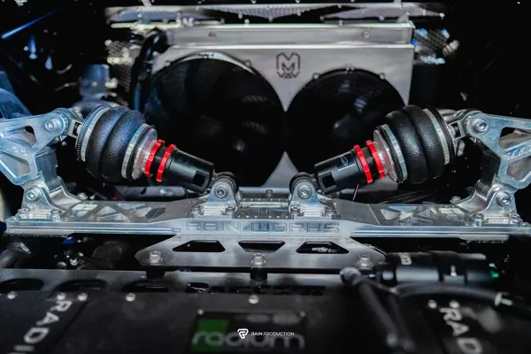 Front suspension and radiator fans