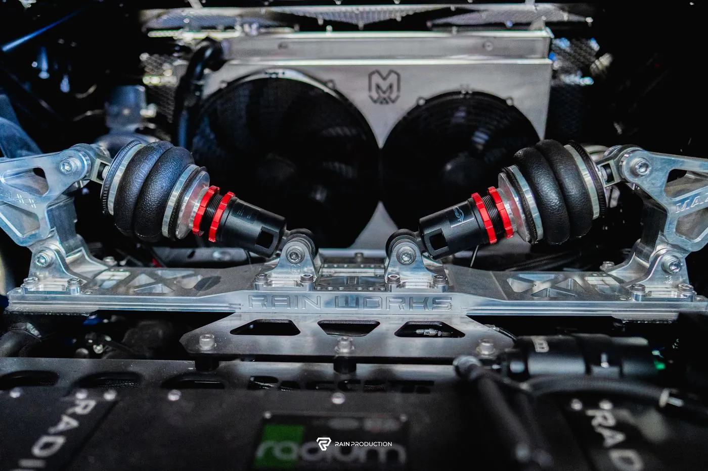 Front suspension and radiator fans