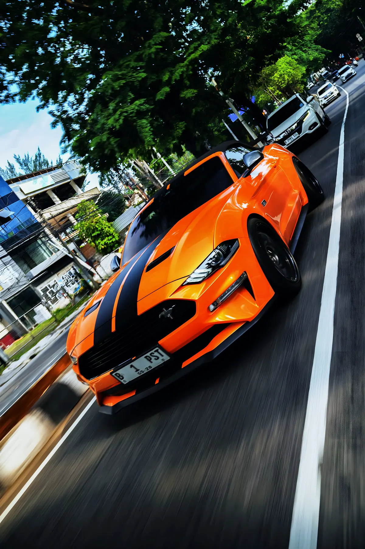Ford Mustang on the move, low angle