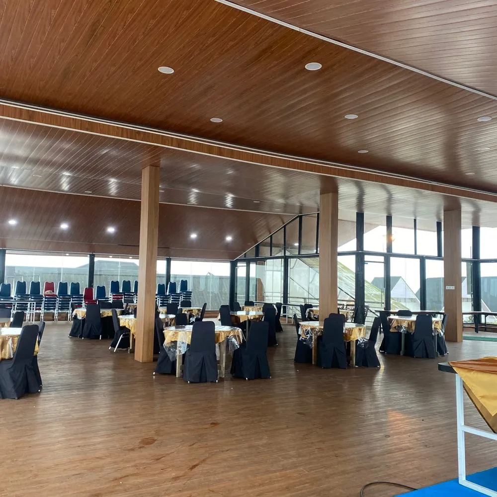 Rows of banquet tables in the Cambai Hill hall