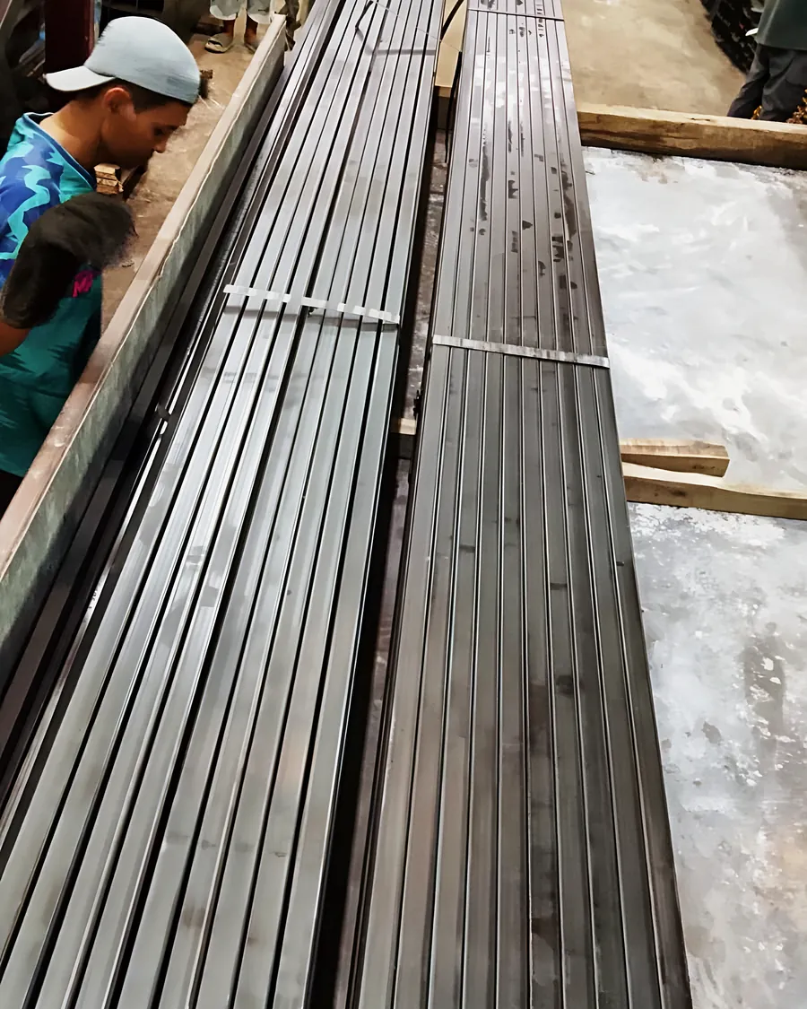 Black hollow sections stacked in long lengths